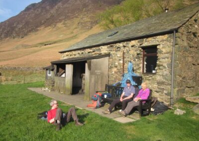 Relaxing at the club's hut in Newlands Valley after a day climbing in the valley.