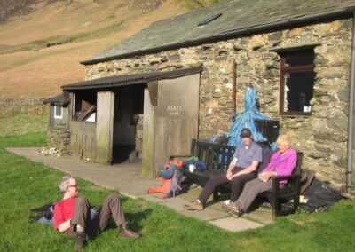 Chatting outside Carlisle Mountaineering Club Hut after a day climbing in Newlands Valley