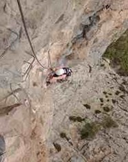 Rob Coles on via ferrata at El Chorro