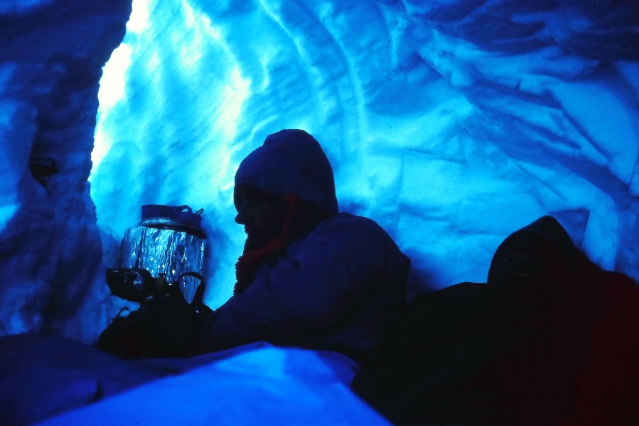 In the snowhole, Dave brewing and Rob getting some shuteye as my bum hangs over the bergschrund.