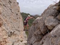 Deb crossing high bridge on via ferrata