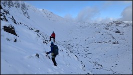 Lizzy D and Simon B in Coire nan Lochan, Glencoe on way to Dorsal Arete